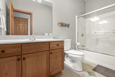 Escape to your perfect vacation retreat in Scenic North Village! on Crystal Mountain Golf Course in Michigan - for sale on GolfHomes.com, golf home, golf lot