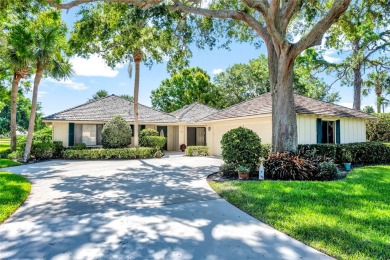 Brand new roof!!!Beautiful lake view villa with private setting on Bent Pine Golf Club in Florida - for sale on GolfHomes.com, golf home, golf lot