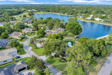 Brand new roof!!!Beautiful lake view villa with private setting on Bent Pine Golf Club in Florida - for sale on GolfHomes.com, golf home, golf lot