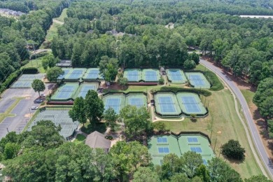 Live in One of Windward's Most Exclusive Neighborhoods with 1.1 on The Golf Club of Georgia in Georgia - for sale on GolfHomes.com, golf home, golf lot