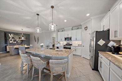 Live in Luxury in this spacious 2 Bedroom + Den single-story on Esplanade Golf and Country at Lakewood Ranch in Florida - for sale on GolfHomes.com, golf home, golf lot
