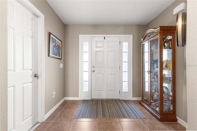 One or more photos have been virtually staged.  Stonecrest is a on Stonecrest Golf and Club Club in Florida - for sale on GolfHomes.com, golf home, golf lot