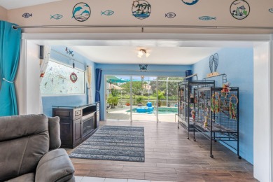Impeccably maintained, DiVosta-built POOL home in Cypress Lake! on Monarch Country Club in Florida - for sale on GolfHomes.com, golf home, golf lot