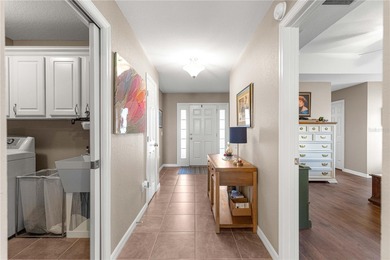 One or more photos have been virtually staged.  Stonecrest is a on Stonecrest Golf and Club Club in Florida - for sale on GolfHomes.com, golf home, golf lot