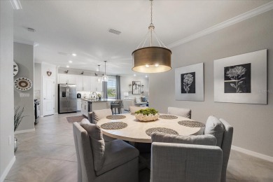 Live in Luxury in this spacious 2 Bedroom + Den single-story on Esplanade Golf and Country at Lakewood Ranch in Florida - for sale on GolfHomes.com, golf home, golf lot