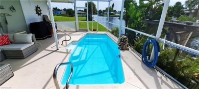 Experience the best of waterfront living in Lochmoor Waterway on El Rio Golf Course and Club in Florida - for sale on GolfHomes.com, golf home, golf lot