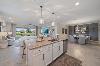Live in Luxury in this spacious 2 Bedroom + Den single-story on Esplanade Golf and Country at Lakewood Ranch in Florida - for sale on GolfHomes.com, golf home, golf lot