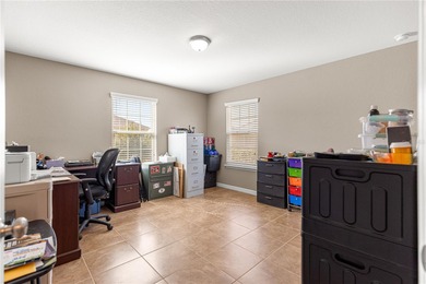 One or more photos have been virtually staged.  Stonecrest is a on Stonecrest Golf and Club Club in Florida - for sale on GolfHomes.com, golf home, golf lot