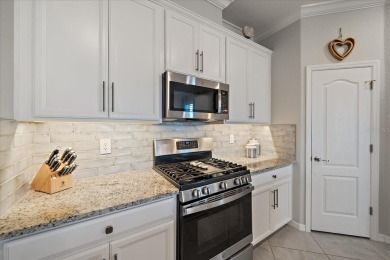 Live in Luxury in this spacious 2 Bedroom + Den single-story on Esplanade Golf and Country at Lakewood Ranch in Florida - for sale on GolfHomes.com, golf home, golf lot
