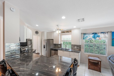 Impeccably maintained, DiVosta-built POOL home in Cypress Lake! on Monarch Country Club in Florida - for sale on GolfHomes.com, golf home, golf lot