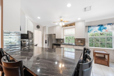 Impeccably maintained, DiVosta-built POOL home in Cypress Lake! on Monarch Country Club in Florida - for sale on GolfHomes.com, golf home, golf lot