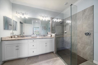 Live in Luxury in this spacious 2 Bedroom + Den single-story on Esplanade Golf and Country at Lakewood Ranch in Florida - for sale on GolfHomes.com, golf home, golf lot