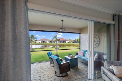 Live in Luxury in this spacious 2 Bedroom + Den single-story on Esplanade Golf and Country at Lakewood Ranch in Florida - for sale on GolfHomes.com, golf home, golf lot