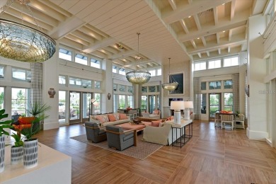 Live in Luxury in this spacious 2 Bedroom + Den single-story on Esplanade Golf and Country at Lakewood Ranch in Florida - for sale on GolfHomes.com, golf home, golf lot