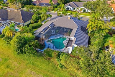 Sprawling single-story home with exceptional outdoor living in on TPC Prestancia in Florida - for sale on GolfHomes.com, golf home, golf lot