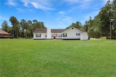 Welcome to this 3-bedroom, 3-bathroom home situated on a on Pine Forest Country Club in Georgia - for sale on GolfHomes.com, golf home, golf lot