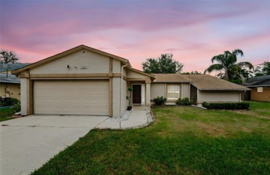 AFFORDABLE HOME IN THE HEART OF SPRING HILL ~ Welcome to this on Oak Hills Country Club in Florida - for sale on GolfHomes.com, golf home, golf lot