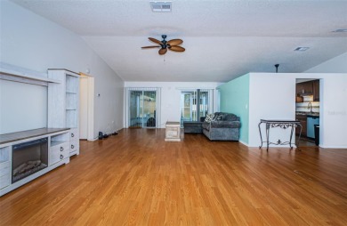 AFFORDABLE HOME IN THE HEART OF SPRING HILL ~ Welcome to this on Oak Hills Country Club in Florida - for sale on GolfHomes.com, golf home, golf lot