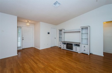 AFFORDABLE HOME IN THE HEART OF SPRING HILL ~ Welcome to this on Oak Hills Country Club in Florida - for sale on GolfHomes.com, golf home, golf lot
