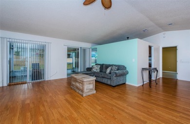AFFORDABLE HOME IN THE HEART OF SPRING HILL ~ Welcome to this on Oak Hills Country Club in Florida - for sale on GolfHomes.com, golf home, golf lot