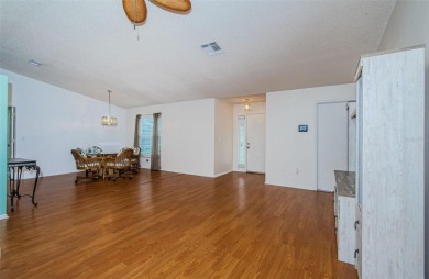 AFFORDABLE HOME IN THE HEART OF SPRING HILL ~ Welcome to this on Oak Hills Country Club in Florida - for sale on GolfHomes.com, golf home, golf lot