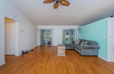 AFFORDABLE HOME IN THE HEART OF SPRING HILL ~ Welcome to this on Oak Hills Country Club in Florida - for sale on GolfHomes.com, golf home, golf lot