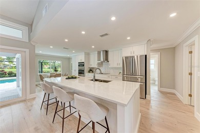 This luxuriously upgraded 5-bedroom, 3-bath home offers an on TPC Prestancia in Florida - for sale on GolfHomes.com, golf home, golf lot