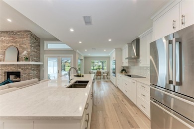 This luxuriously upgraded 5-bedroom, 3-bath home offers an on TPC Prestancia in Florida - for sale on GolfHomes.com, golf home, golf lot