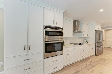 This luxuriously upgraded 5-bedroom, 3-bath home offers an on TPC Prestancia in Florida - for sale on GolfHomes.com, golf home, golf lot