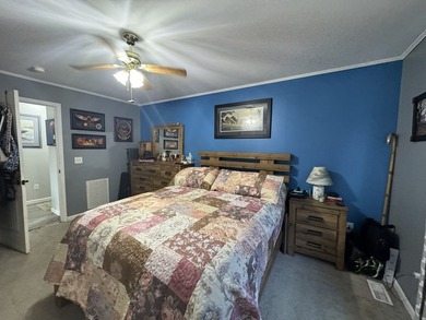 Large home located on an oversized lot in Captain's Cove on Captains Cove Golf and Yacht Club in Virginia - for sale on GolfHomes.com, golf home, golf lot