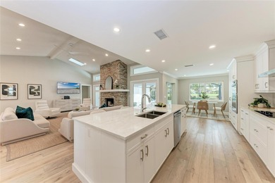 This luxuriously upgraded 5-bedroom, 3-bath home offers an on TPC Prestancia in Florida - for sale on GolfHomes.com, golf home, golf lot