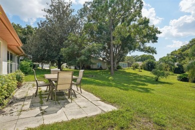 Nestled in the highly sought-after 55+ community of Highland on Highland Lakes Executive Golf Course in Florida - for sale on GolfHomes.com, golf home, golf lot