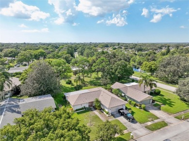 Nestled in the highly sought-after 55+ community of Highland on Highland Lakes Executive Golf Course in Florida - for sale on GolfHomes.com, golf home, golf lot