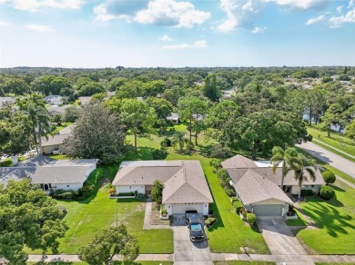 Nestled in the highly sought-after 55+ community of Highland on Highland Lakes Executive Golf Course in Florida - for sale on GolfHomes.com, golf home, golf lot