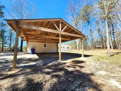 BEAUTIFULLY RENOVATED THROUGHOUT- this spacious 4 Bedroom, 3 on Lions Club Municipal Golf Course in Arkansas - for sale on GolfHomes.com, golf home, golf lot