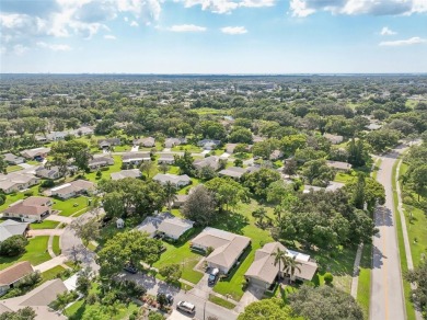 Nestled in the highly sought-after 55+ community of Highland on Highland Lakes Executive Golf Course in Florida - for sale on GolfHomes.com, golf home, golf lot