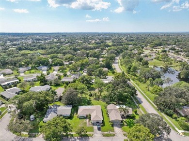 Nestled in the highly sought-after 55+ community of Highland on Highland Lakes Executive Golf Course in Florida - for sale on GolfHomes.com, golf home, golf lot