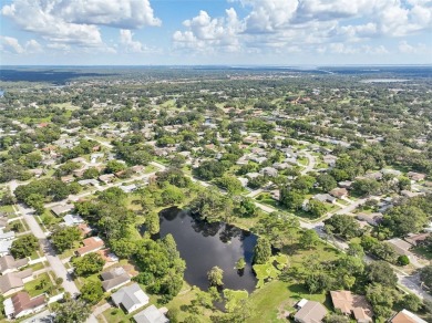 Nestled in the highly sought-after 55+ community of Highland on Highland Lakes Executive Golf Course in Florida - for sale on GolfHomes.com, golf home, golf lot