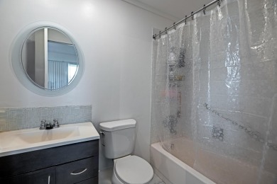 BEAUTIFULLY UPDATED 1/1.1 TOP CORNER UNIT WITH WATER VIEWS FROM on Addison Reserve in Florida - for sale on GolfHomes.com, golf home, golf lot