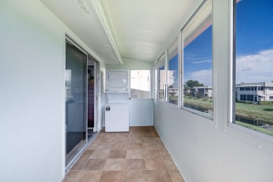 BEAUTIFULLY UPDATED 1/1.1 TOP CORNER UNIT WITH WATER VIEWS FROM on Addison Reserve in Florida - for sale on GolfHomes.com, golf home, golf lot