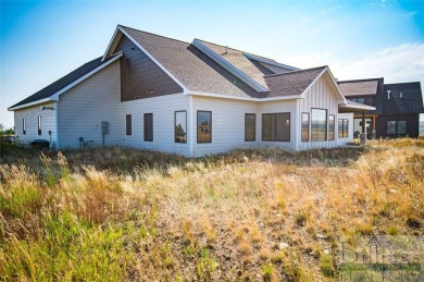 Set against the breathtaking backdrop of the Beartooth Mountains on Red Lodge Golf Club in Montana - for sale on GolfHomes.com, golf home, golf lot