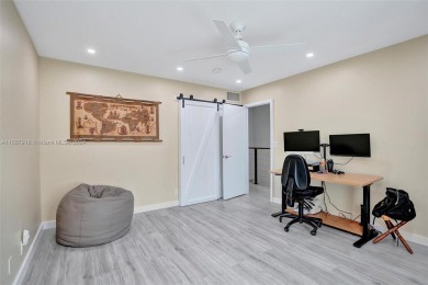 Remarkable + renovated townhouse condo nestled in the heart of on Palm-Aire Country Club and Resort - Palms in Florida - for sale on GolfHomes.com, golf home, golf lot