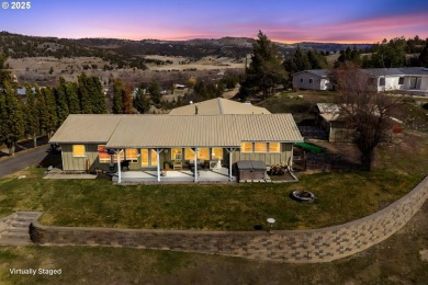 Enjoy the beauty of this custom built home that overlooks the on John Day Golf Club in Oregon - for sale on GolfHomes.com, golf home, golf lot