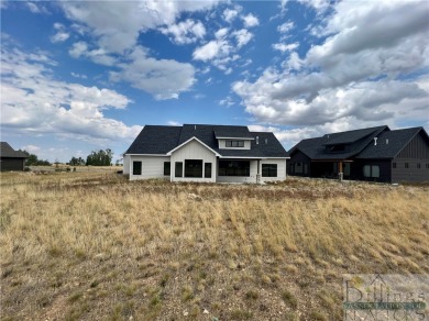 Set against the breathtaking backdrop of the Beartooth Mountains on Red Lodge Golf Club in Montana - for sale on GolfHomes.com, golf home, golf lot