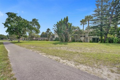 Remarkable + renovated townhouse condo nestled in the heart of on Palm-Aire Country Club and Resort - Palms in Florida - for sale on GolfHomes.com, golf home, golf lot