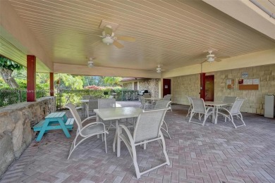 Remarkable + renovated townhouse condo nestled in the heart of on Palm-Aire Country Club and Resort - Palms in Florida - for sale on GolfHomes.com, golf home, golf lot