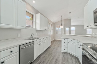 Beautifully updated brick home in desirable Oak Pointe! This on Tiger Point Golf and Country Club in Florida - for sale on GolfHomes.com, golf home, golf lot