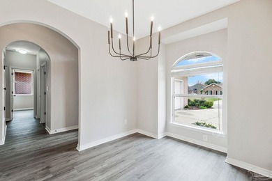 Beautifully updated brick home in desirable Oak Pointe! This on Tiger Point Golf and Country Club in Florida - for sale on GolfHomes.com, golf home, golf lot