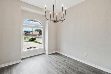 Beautifully updated brick home in desirable Oak Pointe! This on Tiger Point Golf and Country Club in Florida - for sale on GolfHomes.com, golf home, golf lot