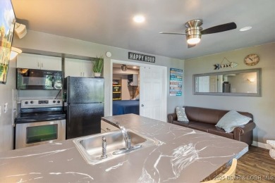 Charming Remodeled Condo with Sweeping Main Channel Views - Just on Seasons Ridge At Four Seasons in Missouri - for sale on GolfHomes.com, golf home, golf lot